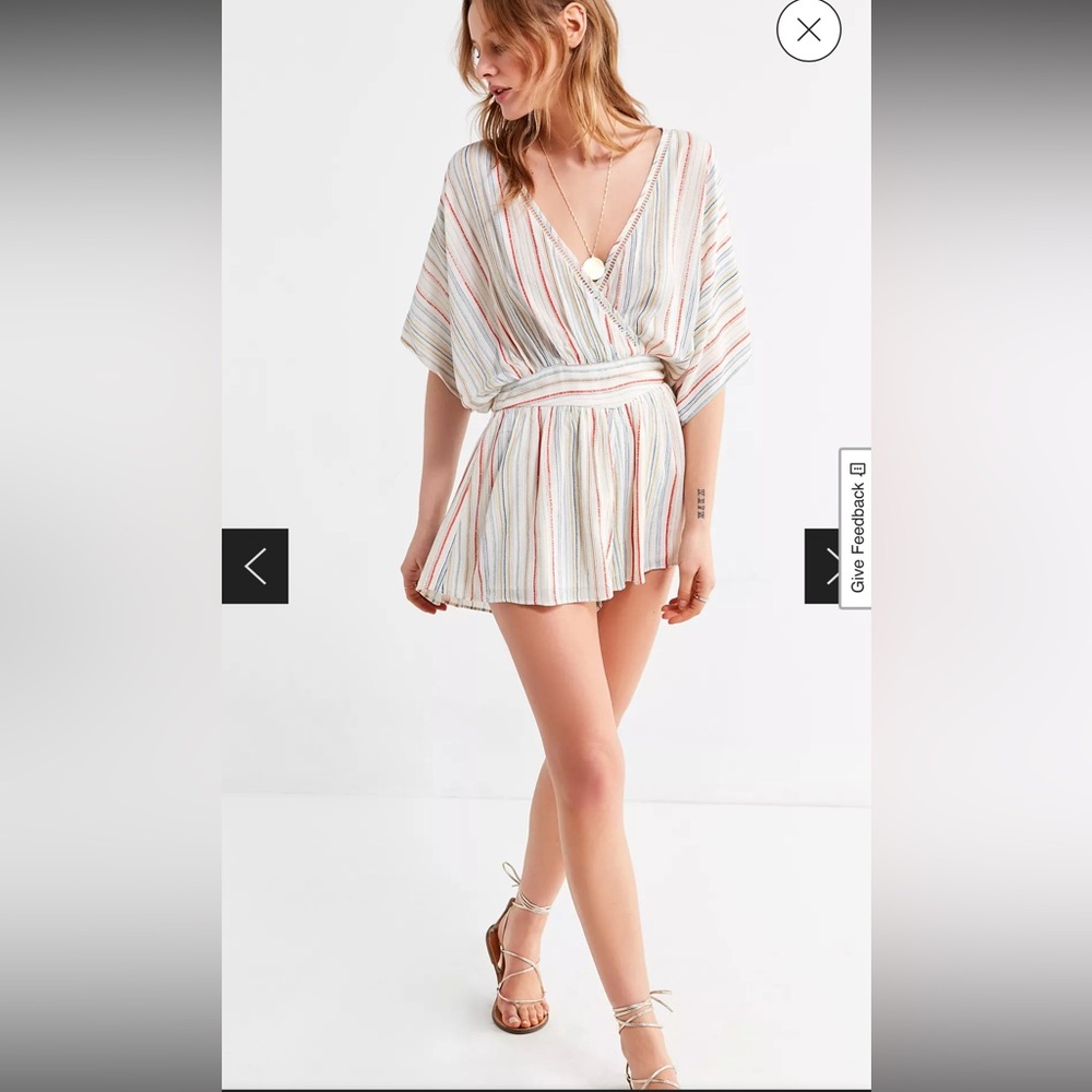 🍄Supremely ‘70s surplice romper from Urban Outfitters small 100% Rayon